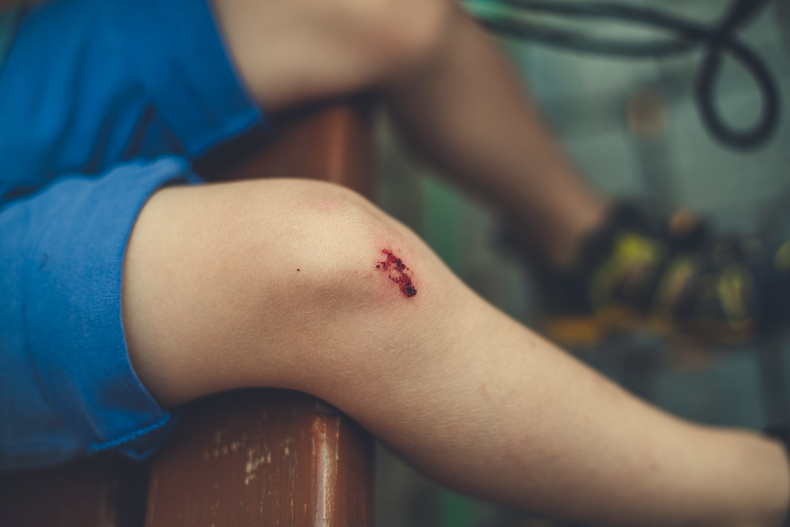 a person with a small tattoo on their arm, liability